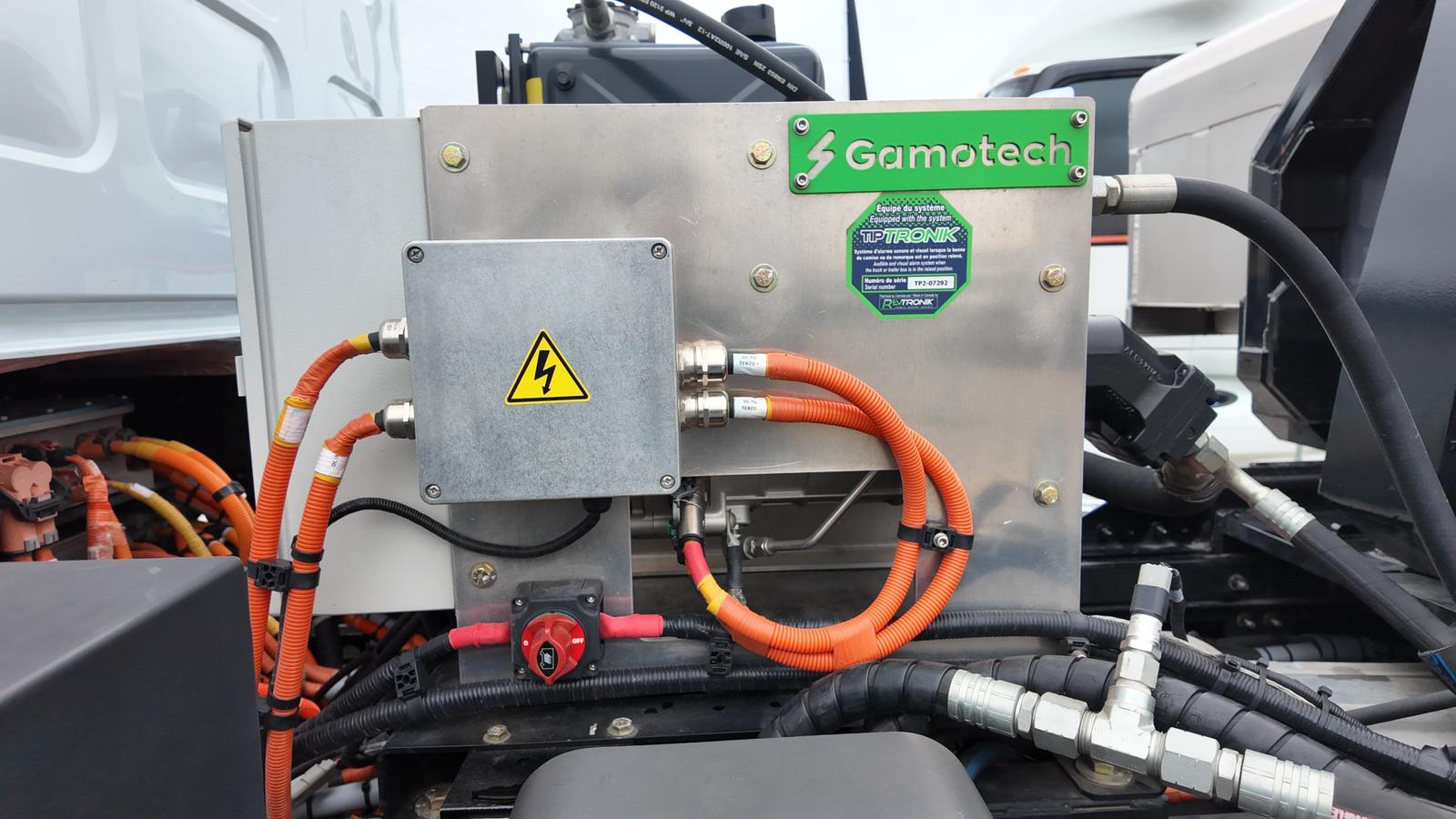 Close-up of Gamo-X power unit installed on a work truck